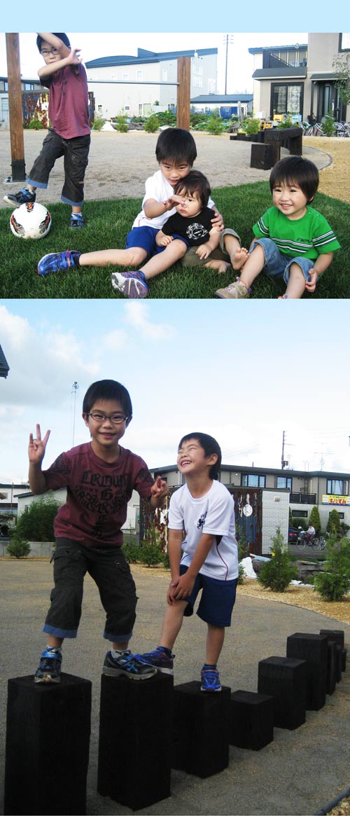 お庭で遊ぶ子供の景